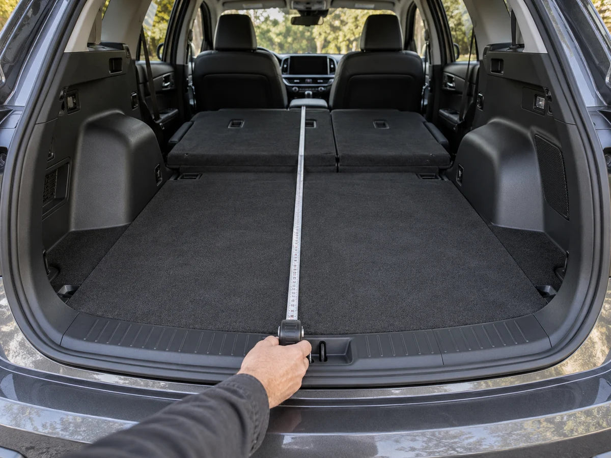 Checking the dimensions of an SUV cargo area