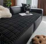 The bed used indoors as a sofa cover